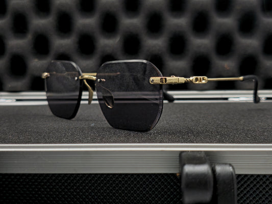 Lentes dorado y negro