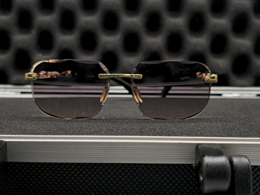 Lentes cartier negros y dorado pardo