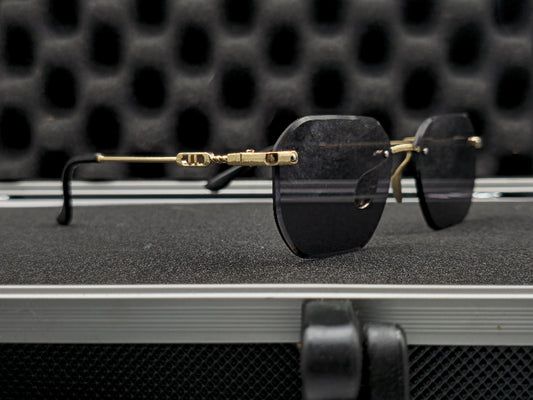 Lentes dorado y negro