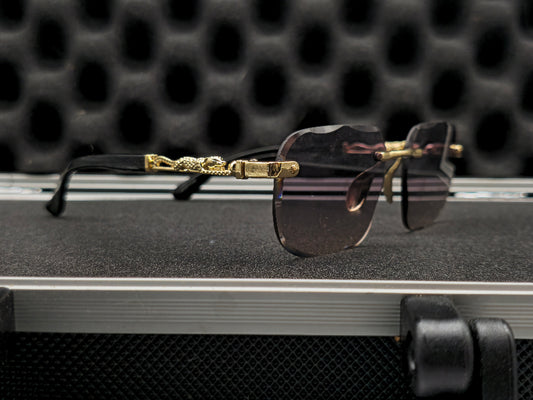 Lentes cartier negros y dorado pardo