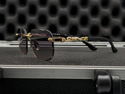 Lentes cartier negros y dorado pardo